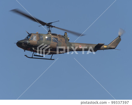 Ground Self-Defense Force utility helicopter in flight 99337397
