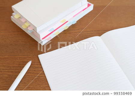 Notebook and reference book study image 99338469