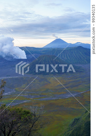 Mount Bromo, Mount Batok, Mount Semeru and plains at dawn (East Java) 99340135