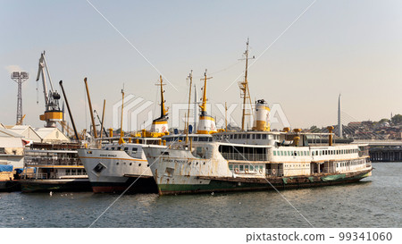 Golden Horn coast with docked ferry boats, Istanbul, Turkey Golden Horn coast with docked ferry boats, Istanbul, Turkey 99341060