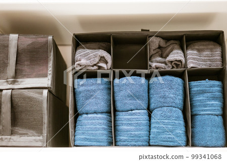 there are clean towels on the shelf in the closet there are clean towels on the shelf in the closet 99341068