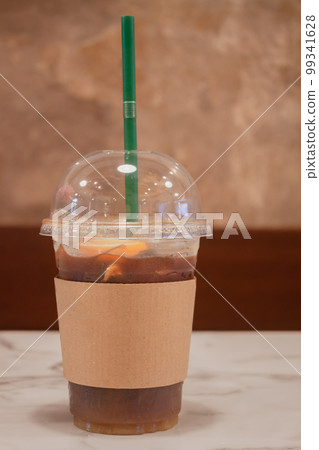 Iced coffee with orange in coffee shop Iced coffee with orange in coffee shop 99341628
