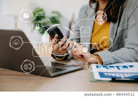 Web hosting concept, woman using computer, tablet and presses his finger on the virtual screen inscription Hosting on desk, Internet, business, digital technology concept... Web hosting concept, woman using computer, tablet and presses his finger on the virtual screen inscription Hosting on desk, Internet, business, digital technology concept... 99344512