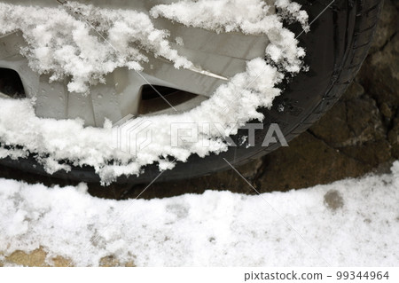 snow on car tires 99344964