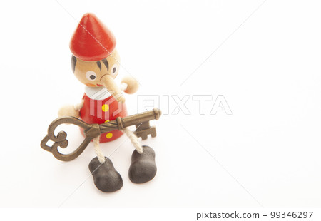 image of wooden toy key white background 99346297
