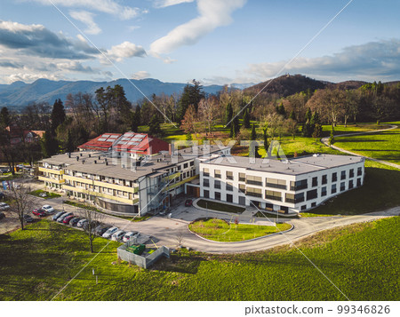 Aerial view of office buildings on a remote location in the country side of Slovenia Aerial view of office buildings on a remote location in the country side of Slovenia 99346826