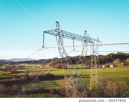 Electrical wires running to and from the electrical towers across the countryside of Slovenia Electrical wires running to and from the electrical towers across the countryside of Slovenia 99347848