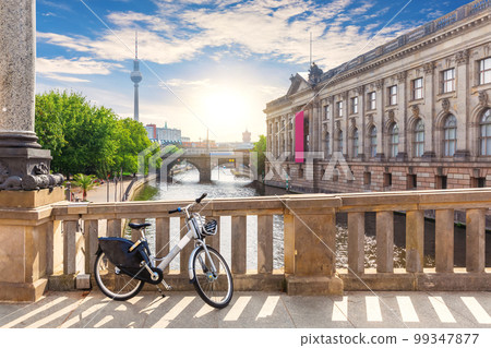 Bike in a good weather on the Bridge over the river Spree in Berlin near the TV tower and museums, Germany Bike in a good weather on the Bridge over the river Spree in Berlin near the TV tower and museums, Germany 99347877