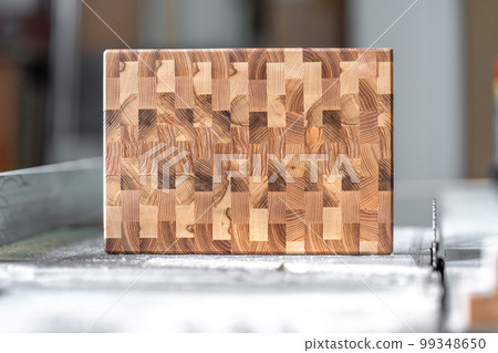 creative wooden board on a sawmill in a carpentry shop creative wooden board on a sawmill in a carpentry shop 99348650