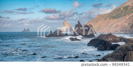 A Panoramic View of Tenerife's Rugged Coastline with a Photogenic Couple 99349341