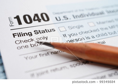 Tax form 1040 U.S. Individual Income Tax Return, business finance concept. Tax form 1040 U.S. Individual Income Tax Return, business finance concept. 99349884