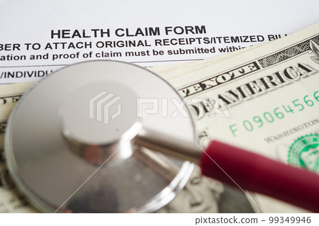 Health claim form with stethoscope and US dollar banknotes, insurance accident medical concept. 99349946