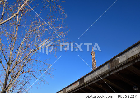 Paris, France. The Eiffel Tower seen through the fence. Taken on February 6, 2023. 99352227