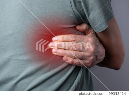 Intercostal neuralgia. Man suffering from backache with red point closeup. Pain under blade shade. Diseases, treatment concept Intercostal neuralgia. Man suffering from backache with red point closeup. Pain under blade shade. Diseases, treatment concept 99352414