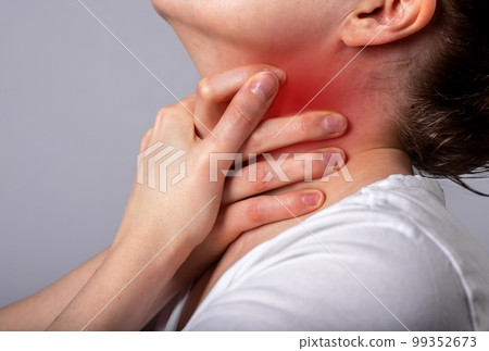 Asthma attack. Woman suffocating, breathing heavily. Sore throat. Hands holding neck with red spot closeup. Respiratory diseases, medicine concept Asthma attack. Woman suffocating, breathing heavily. Sore throat. Hands holding neck with red spot closeup. Respiratory diseases, medicine concept 99352673