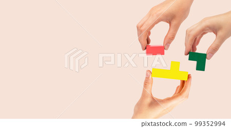 Banner with hands joining puzzle pieces. Teamwork, partnership concept. Help and support among colleagues, teambuilding. Copy space 99352994