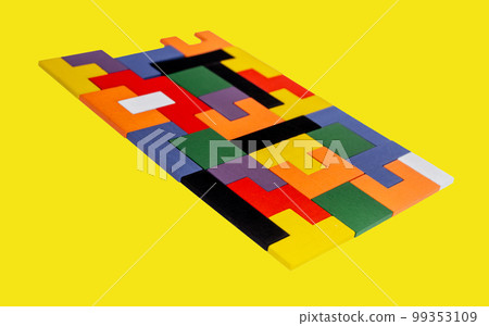 Bright wood puzzle blocks together. Cretivity, solved tasks concept Bright wood puzzle blocks together. Cretivity, solved tasks concept 99353109