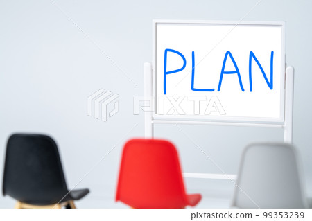 PLAN letters written on a whiteboard 99353239