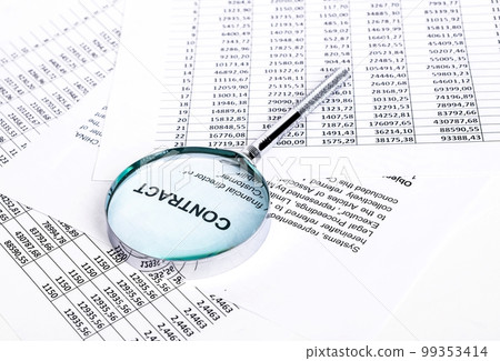 Magnifying glass at contract and financial documents. Statistics and agreement thorough analysis and check for cooperation results assessment. Auditor job. 99353414