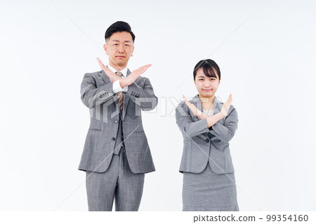 Men and women in suits who pose for denial and rejection 99354160