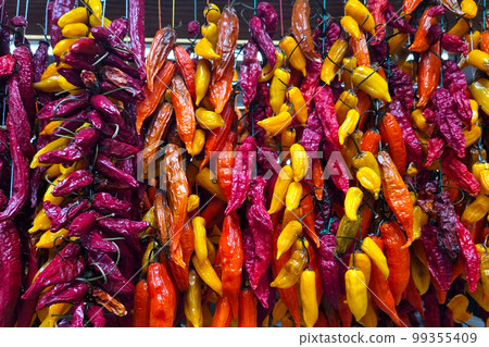 Dried peppers on the market. Sale of vegetables and fruits. Dried peppers on the market. Sale of vegetables and fruits. 99355409