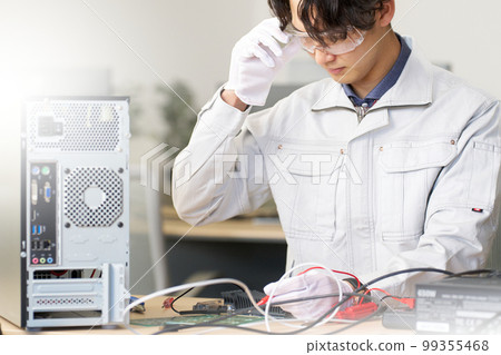 Male staff checking electronic circuits Electrical engineer Mechanical engineer Business image Male staff checking electronic circuits Electrical engineer Mechanical engineer Business image 99355468