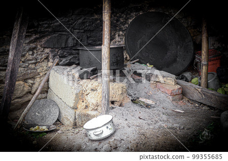 An outdoor mud oven in a rural village. Dark spooky themes. An outdoor mud oven in a rural village. Dark spooky themes. 99355685