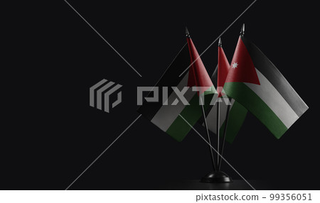 Small national flags of the Jordan on a black background Small national flags of the Jordan on a black background 99356051