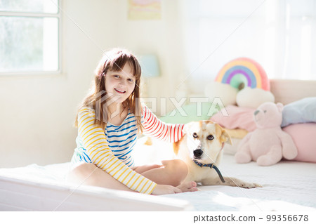 Child playing with dog. Kids play with puppy. Child playing with dog. Kids play with puppy. 99356678