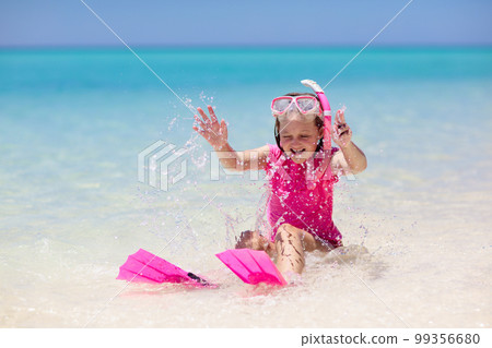 Kids snorkel. Children snorkeling in tropical sea. 99356680