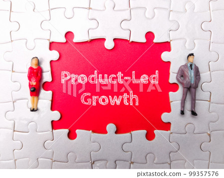 White puzzle and miniature people with the word Product Led Growth on red background. 99357576