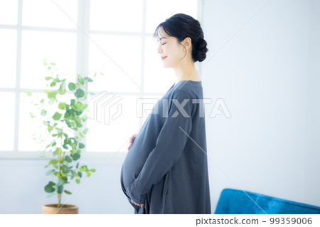 Pregnant woman living room Pregnant woman living room 99359006