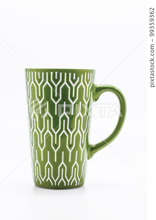 one shabby green cup isolated on a white background 99359362