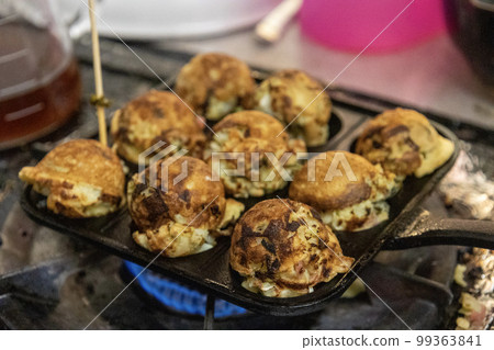 Takoyaki without octopus cooked on the stove at home Takoyaki without octopus cooked on the stove at home 99363841