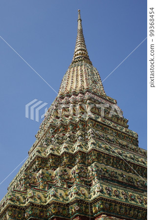 Pagoda at Wat Pho in Thailand against the blue sky 99368454