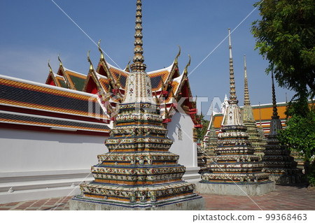 Pagoda at Wat Pho in Thailand against the blue sky 99368463