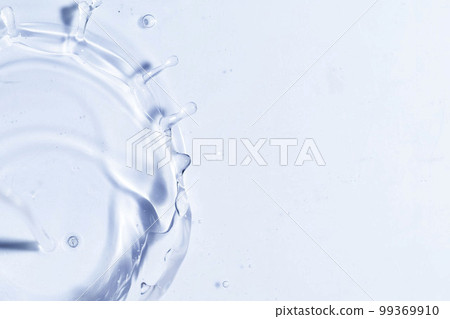Close-up of fresh and transparent splashes of water or lotion, micellar in the form of a crown Close-up of fresh and transparent splashes of water or lotion, micellar in the form of a crown 99369910