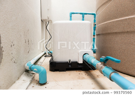 automatic water pump station outside the house 99370560