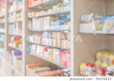 pharmacy drugstore shelves interior blurred abstract background pharmacy drugstore shelves interior blurred abstract background 99370819