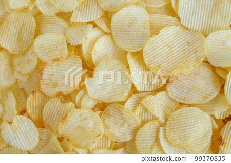 crispy potato chips snack texture background 99370835