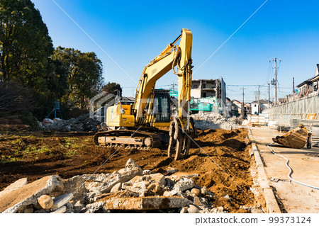 Demolition work site Heavy backhoe Demolition work site Heavy backhoe 99373124