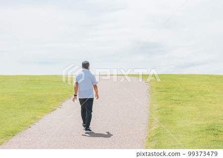 Elderly man walking and aerobic exercise in the park 99373479