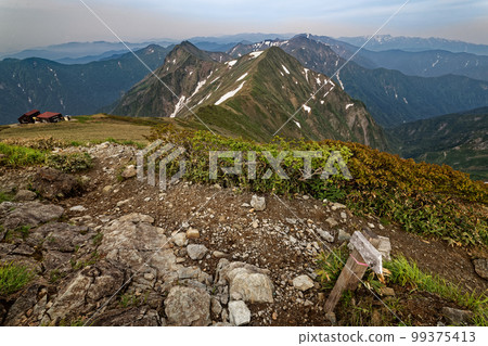 Joetsu border ridgeline in early summer seen from the summit of Tanigawadake 99375413