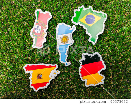 Portugal,German,Spain,Argentina and brazil flag sticker is on a green field. 99375652