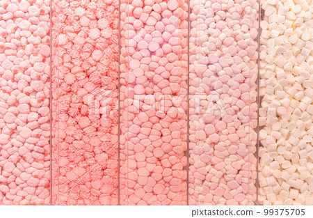 Pastel pink marshmallows in a shop window 99375705