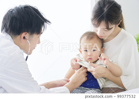 infants undergoing medical examination 99377532