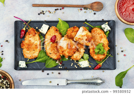 Breaded chicken breast. Breaded chicken breast. 99380932