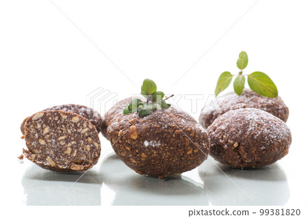 chocolate sweet cakes from mashed biscuits with additives chocolate sweet cakes from mashed biscuits with additives 99381820