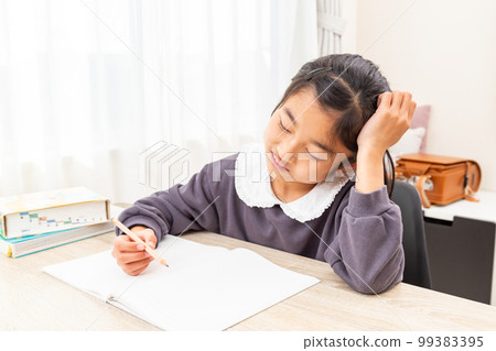 Girl studying in the room Girl studying in the room 99383395