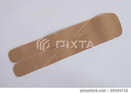 Power of Kinesio Tape for Pain Relief and Improved Mobility. The cut out Sticker is ready to be pasted on the Body. 99384716